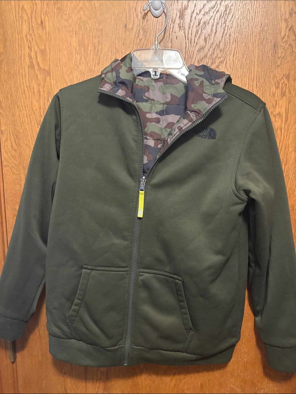 The North Face child size 14/16 reversible Camo and olive green jacket